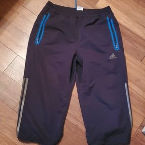 Black and blue Adidas capris